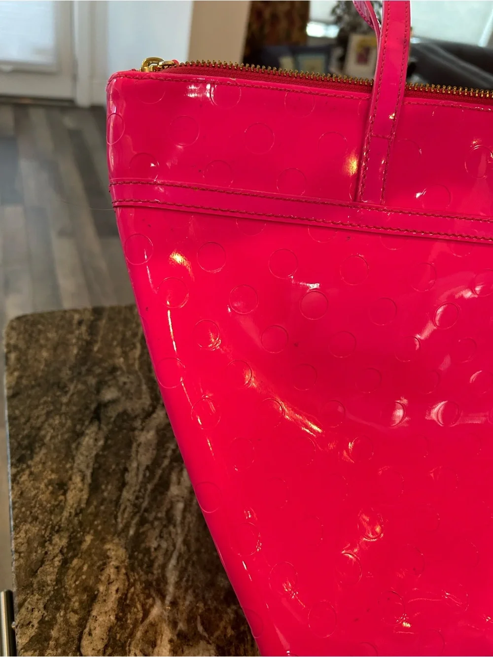 kate spade camellia st Sophie Tote in Hot Pink has a few marks scuffs peeling
